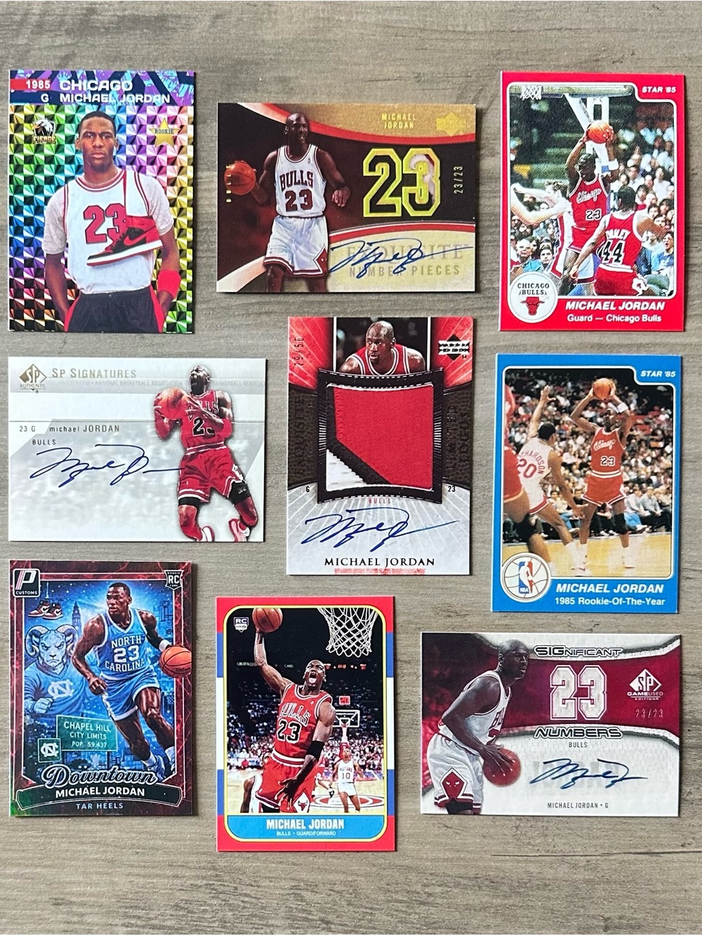 Michael Jordan Signed Rookie Lot of (9) Star UD Fleer Novelty Cards.